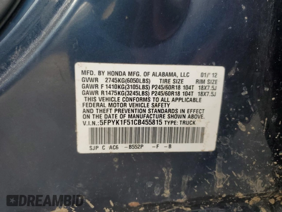 2012 Honda Ridgeline RTL z VIN 5FPYK1F51CB455815, wystawiony jako Copart lot #50969885 z przebiegiem Nie podano mil oraz Szkoda całkowita • Salvage title. Historia ofert i sprzedaży dostępna na DreamBid. Obrazek 12.