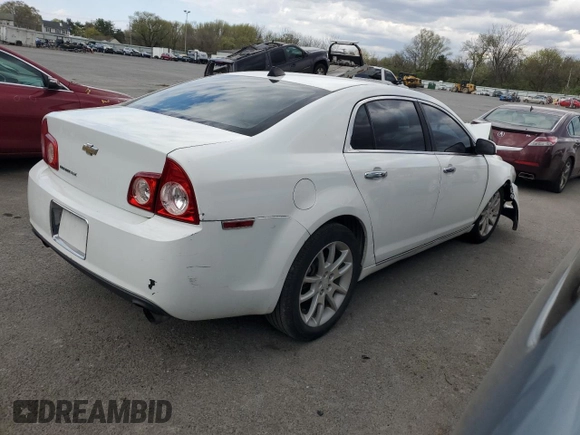 2012 Chevrolet Malibu LTZ with VIN 1G1ZG5E72CF279662, listed as a Copart auction lot 52764605 with 123,848 mi miles and Salvage Title. Bid and sale history available at DreamBid. Image 3.