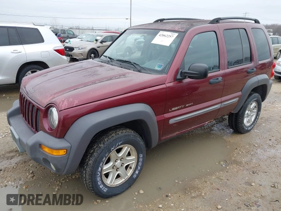 2002 Jeep Liberty Sport with VIN 1J4GL48K12W270609, listed as a IAAI auction lot 42062257 with 120,667 mi miles. Bid and sale history available at carsss.com. Image 2.