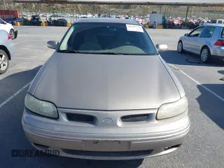 1999 Oldsmobile Cutlass GL z VIN 1G3NB52M9X6313424, wystawiony jako IAAI lot #42345276 z przebiegiem 191 527 mil mil oraz . Historia ofert i sprzedaży dostępna na DreamBid. Obrazek 6.