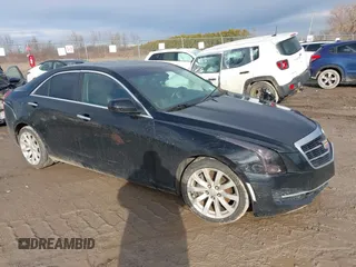 2018 Cadillac ATS RWD z VIN 1G6AA5RX9J0180386, wystawiony jako IAAI lot #41205001 z przebiegiem 87 033 mil mil oraz . Historia ofert i sprzedaży dostępna na DreamBid. Obrazek 1.