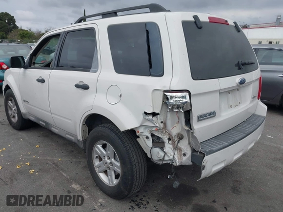 2009 Ford Escape Hybrid with VIN 1FMCU49379KA89407, listed as a IAAI auction lot 41692553 with 172,637 mi miles. Bid and sale history available at carsss.com. Image 3.