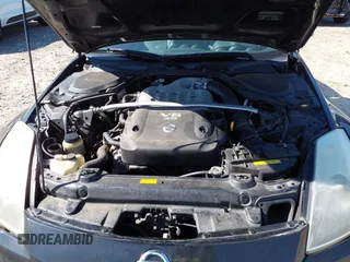 2006 Nissan 350Z Touring with VIN JN1AZ36A46M480186, listed as a IAAI auction lot 41663579 with 114,176 mi miles. Bid and sale history available at carsss.com. Image 10.