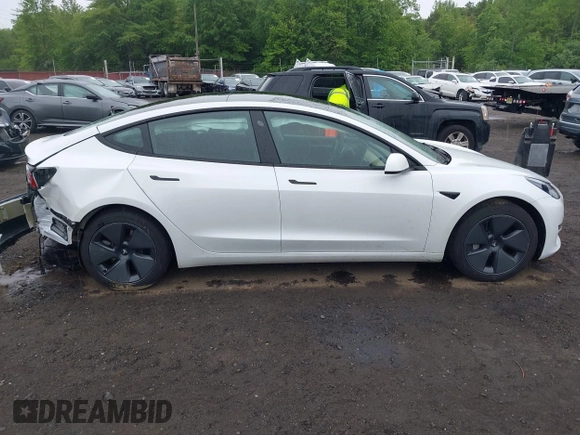 2023 Tesla Model 3 z VIN 5YJ3E1EA6PF570876, wystawiony jako IAAI lot #42366310 z przebiegiem 13 005 mil mil oraz . Historia ofert i sprzedaży dostępna na DreamBid. Obrazek 13.