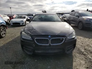 2017 BMW M6 z VIN WBS6E9C52HG437288, wystawiony jako Copart lot #38576804 z przebiegiem 25 137 mil mil oraz Tytuł czysty. Historia ofert i sprzedaży dostępna na DreamBid. Obrazek 5.