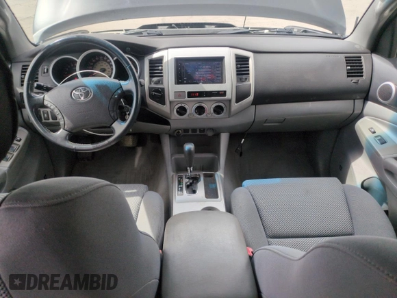 2009 Toyota Tacoma with VIN 3TMLU42N39M024000, listed as a Copart auction lot 55301375 with 210,068 mi miles and Salvage Title. Bid and sale history available at DreamBid. Image 8.