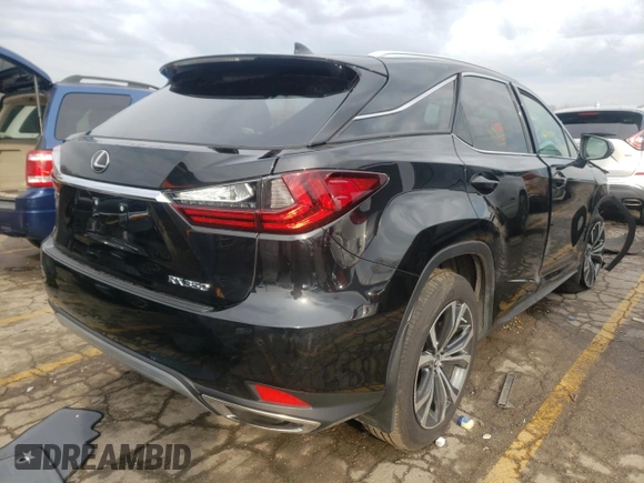 2022 Lexus RX with VIN 2T2HZMDA5NC311659, listed as a Copart auction lot 66092572 with 13,983 mi miles. Bid and sale history available at carsss.com. Image 4.
