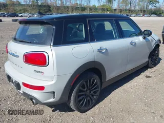 2019 MINI Clubman Cooper S z VIN WMWLN9C57K2H60248, wystawiony jako IAAI lot #42111586 z przebiegiem 46 882 mil mil oraz . Historia ofert i sprzedaży dostępna na DreamBid. Obrazek 4.