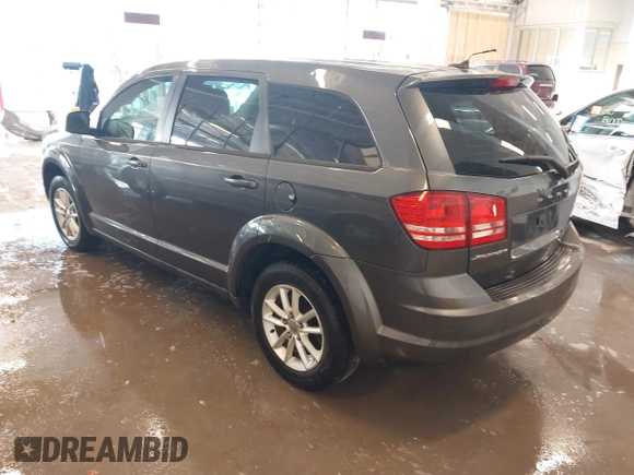 2014 Dodge Journey American Value Pkg with VIN 3C4PDCAB1ET153064, listed as a IAAI auction lot 41254848 with 179,905 mi miles. Bid and sale history available at carsss.com. Image 3.