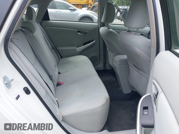 2012 Toyota Prius One z VIN JTDKN3DU3C5461466, wystawiony jako IAAI lot #42340404 z przebiegiem 130 611 mil mil oraz . Historia ofert i sprzedaży dostępna na DreamBid. Obrazek 8.