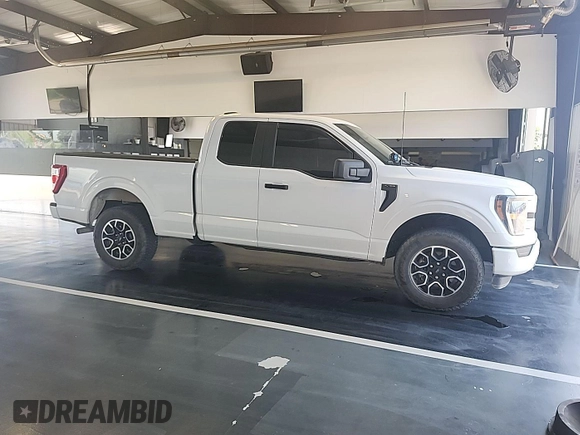 2023 Ford F-150 XL with VIN 1FTEX1EP1PKD56789, listed as a IAAI auction lot 42802275 with 52,497 mi miles and . Bid and sale history available at DreamBid. Image 9.