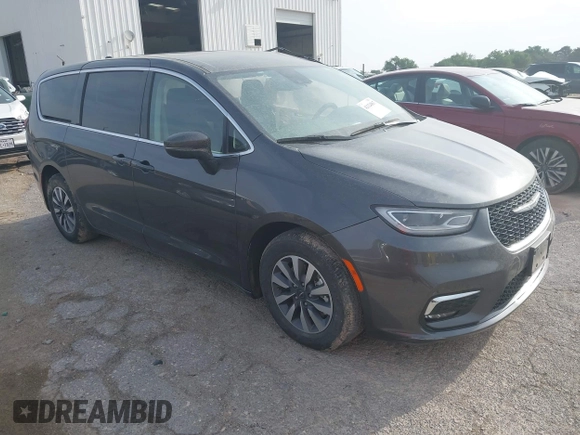 2023 Chrysler Pacifica Hybrid Touring L z VIN 2C4RC1L73PR598923, wystawiony jako IAAI lot #42124867 z przebiegiem 51 173 mil mil oraz . Historia ofert i sprzedaży dostępna na DreamBid. Obrazek 1.