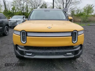 2023 Rivian R1S Adventure z VIN 7PDSGABA1PN009442, wystawiony jako Copart lot #55835815 z przebiegiem 28 048 mil mil oraz Szkody całkowita. Historia ofert i sprzedaży dostępna na DreamBid. Obrazek 5.