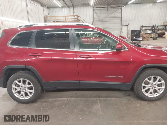 2016 Jeep Cherokee Latitude z VIN 1C4PJMCS7GW104458, wystawiony jako IAAI lot #42112371 z przebiegiem 99 723 mil mil oraz . Historia ofert i sprzedaży dostępna na DreamBid. Obrazek 14.