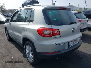 2011 Volkswagen Tiguan SEL with VIN WVGBV7AX2BW500817, listed as a IAAI auction lot 42292760 with 50,336 mi miles and . Bid and sale history available at DreamBid. Image 3.