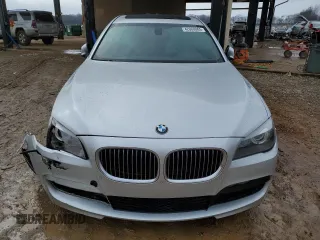 2012 BMW 7 Series 740Li with VIN WBAKB4C50CC576043, listed as a Copart auction lot 42060065 with 142,017 mi miles and Salvage Title. Bid and sale history available at carsss.com. Image 5.