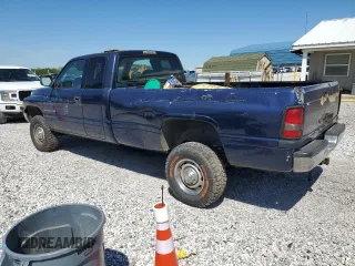 2001 Dodge 2500 with VIN 1B7KF23Z81J581286, listed as a Copart auction lot 54329385 with 148,859 mi miles and Salvage title. Bid and sale history available at DreamBid. Image 2.