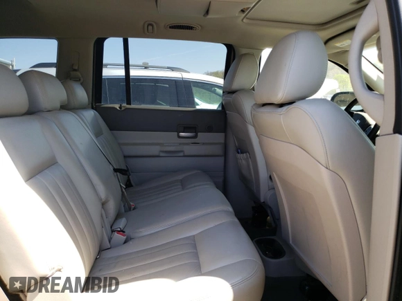 2005 Dodge Durango Limited with VIN 1D8HB58D65F615577, listed as a Copart auction lot 54408425 with 143,011 mi miles and Salvage Title. Bid and sale history available at DreamBid. Image 11.