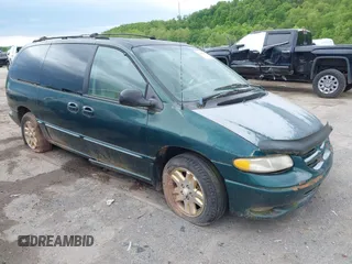 1997 Dodge Grand Caravan with VIN 1B4GT54L6VB439994, listed as a IAAI auction lot 42206857 with 242,219 mi miles and . Bid and sale history available at DreamBid. Image 1.