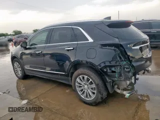 2017 Cadillac XT5 Luxury FWD z VIN 1GYKNBRS9HZ160664, wystawiony jako Copart lot #55856915 z przebiegiem 98 161 mil mil oraz Szkody całkowita. Historia ofert i sprzedaży dostępna na DreamBid. Obrazek 2.