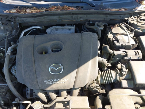 2016 Mazda Mazda3 i Grand Touring with VIN JM1BM1N74G1333699, listed as a IAAI auction lot 41836178 with 194,946 mi miles. Bid and sale history available at carsss.com. Image 10.
