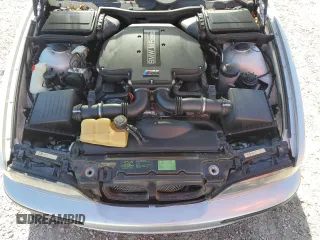 2000 BMW M5 z VIN WBSDE9342YBZ96884, wystawiony jako Copart lot #81061134 z przebiegiem 144 475 mil mil oraz Nie do naprawy • Non repairable. Historia ofert i sprzedaży dostępna na DreamBid. Obrazek 11.