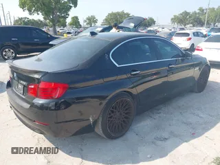 2012 BMW 5 Series 528i with VIN WBAXG5C58CDX05153, listed as a IAAI auction lot 42196906 with 120,652 mi miles. Bid and sale history available at carsss.com. Image 4.