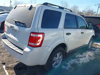 2009 Ford Escape XLS with VIN 1FMCU02729KA51377, listed as a IAAI auction lot 41404063 with 104,582 mi miles and . Bid and sale history available at DreamBid. Image 4.