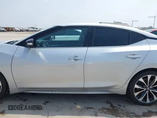 2017 Nissan Maxima SR z VIN 1N4AA6AP9HC397126, wystawiony jako IAAI lot #42291477 z przebiegiem 115 201 mil mil oraz . Historia ofert i sprzedaży dostępna na DreamBid. Obrazek 14.
