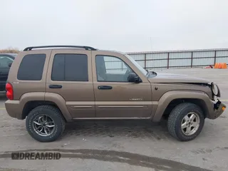 2002 Jeep Liberty Limited with VIN 1J8GL58K02W223852, listed as a IAAI auction lot 41966846 with 101,775 mi miles and . Bid and sale history available at carsss.com. Image 14.