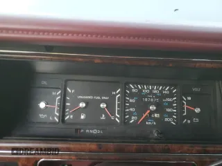 1993 Chrysler New Yorker z VIN 1C3XV66R3PD198654, wystawiony jako Copart lot #78900554 z przebiegiem 187 872 mil mil oraz Szkody całkowita. Historia ofert i sprzedaży dostępna na DreamBid. Obrazek 9.