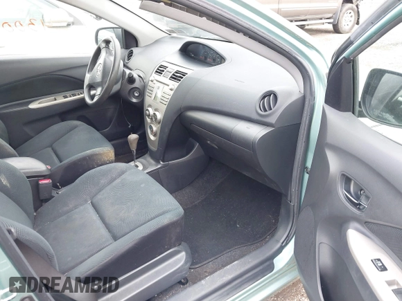 2010 Toyota Yaris with VIN JTDBT4K31A4075508, listed as a IAAI auction lot 42214300 with 192,616 mi miles. Bid and sale history available at carsss.com. Image 5.
