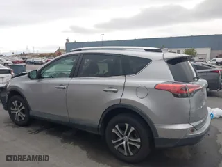 2016 Toyota RAV4 LE with VIN 2T3ZFREV6GW296324, listed as a IAAI auction lot 40922529 with 138,107 mi miles. Bid and sale history available at carsss.com. Image 3.