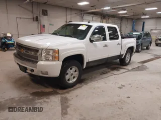 2007 Chevrolet Silverado 1500 LT w/2LT with VIN 2GCEK13MX71677513, listed as a IAAI auction lot 42023608 with 144,555 mi miles. Bid and sale history available at carsss.com. Image 2.