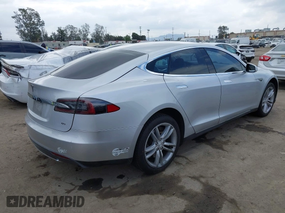 2013 Tesla Model S with VIN 5YJSA1DG7DFP11382, listed as a IAAI auction lot 42056169 with 126,975 mi miles. Bid and sale history available at carsss.com. Image 4.