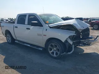 2018 Ram 1500 Tradesman z VIN 1C6RR7KTXJS279077, wystawiony jako IAAI lot #42026315 z przebiegiem 110 965 mil mil oraz . Historia ofert i sprzedaży dostępna na DreamBid. Obrazek 1.