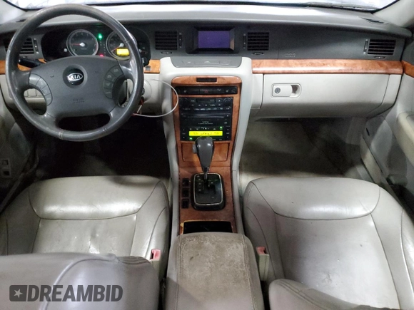 2005 Kia Amanti z VIN KNALD124755058346, wystawiony jako Copart lot #41683255 z przebiegiem 180 396 mil mil oraz Szkoda całkowita • Salvage title. Historia ofert i sprzedaży dostępna na DreamBid. Obrazek 8.