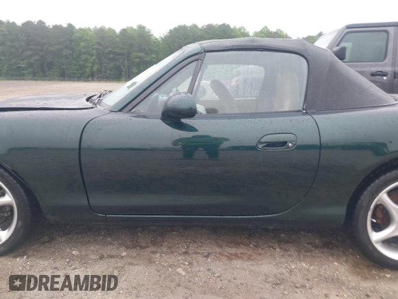 1999 Mazda MX-5 Miata with VIN JM1NB3539X0123231, listed as a IAAI auction lot 42314156 with 154,755 mi miles and . Bid and sale history available at DreamBid. Image 14.