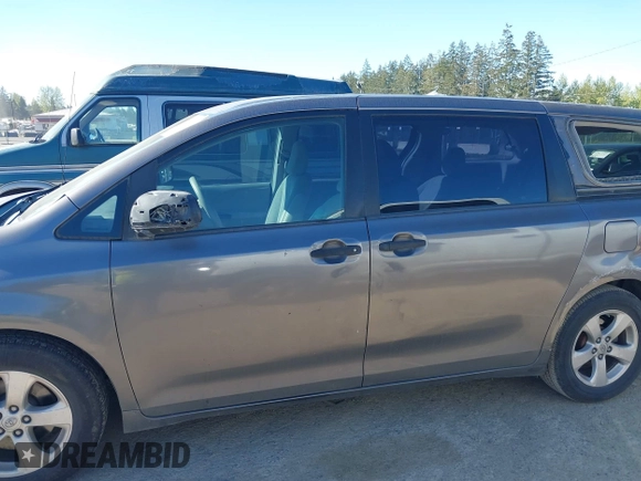 2013 Toyota Sienna L with VIN 5TDZK3DC1DS400675, listed as a IAAI auction lot 42053231 with 85,070 mi miles. Bid and sale history available at carsss.com. Image 14.