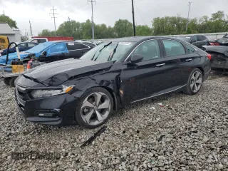 2018 Honda Accord Touring z VIN 1HGCV2F93JA046323, wystawiony jako Copart lot #55622205 z przebiegiem 167 525 mil mil oraz Szkoda całkowita • Salvage title. Historia ofert i sprzedaży dostępna na DreamBid. Obrazek 1.