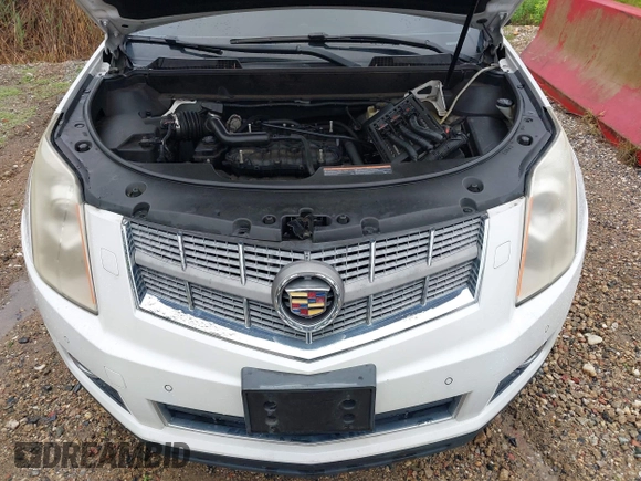2010 Cadillac SRX Premium Collection z VIN 3GYFNCEY4AS569787, wystawiony jako IAAI lot #42524167 z przebiegiem 222 000 mil mil oraz . Historia ofert i sprzedaży dostępna na DreamBid. Obrazek 10.