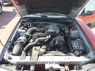1994 Ford Mustang z VIN 1FALP4440RF192985, wystawiony jako IAAI lot #42234160 z przebiegiem 166 929 mil mil oraz . Historia ofert i sprzedaży dostępna na DreamBid. Obrazek 10.