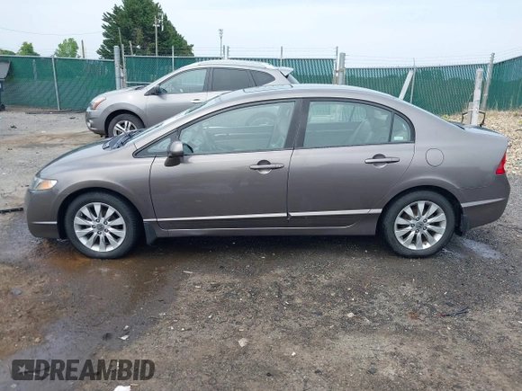2009 Honda Civic z VIN 1HGFA15999L023648, wystawiony jako IAAI lot #42292289 z przebiegiem 279 822 mil mil oraz . Historia ofert i sprzedaży dostępna na DreamBid. Obrazek 14.