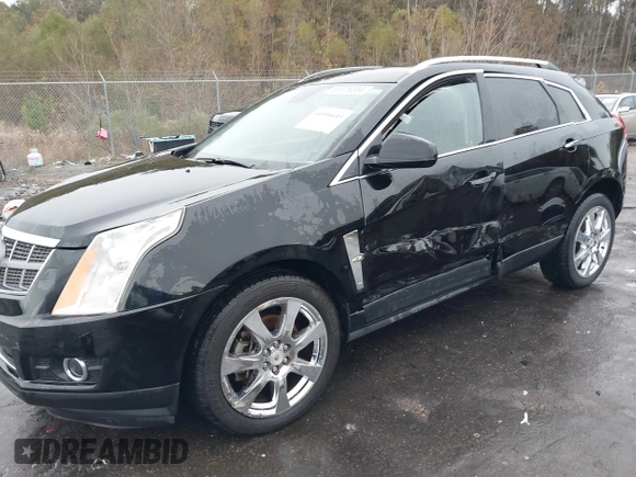 2011 Cadillac SRX Performance Collection with VIN 3GYFNBEYXBS597881, listed as a IAAI auction lot 41016643 with 164,781 mi miles and . Bid and sale history available at carsss.com. Image 6.
