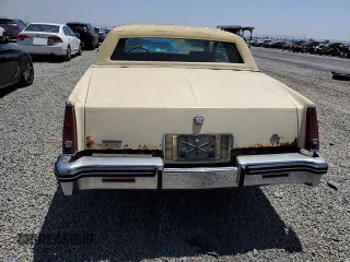 1985 Cadillac Eldorado z VIN 1G6EL5782FE675028, wystawiony jako Copart lot #57709655 z przebiegiem 63 347 mil mil oraz Tytuł czysty. Historia ofert i sprzedaży dostępna na DreamBid. Obrazek 6.