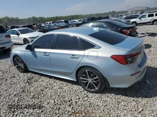 2023 Honda Civic Touring z VIN 2HGFE1F94PH310134, wystawiony jako Copart lot #52311085 z przebiegiem 32 682 mil mil oraz Szkoda całkowita • Salvage title. Historia ofert i sprzedaży dostępna na DreamBid. Obrazek 2.