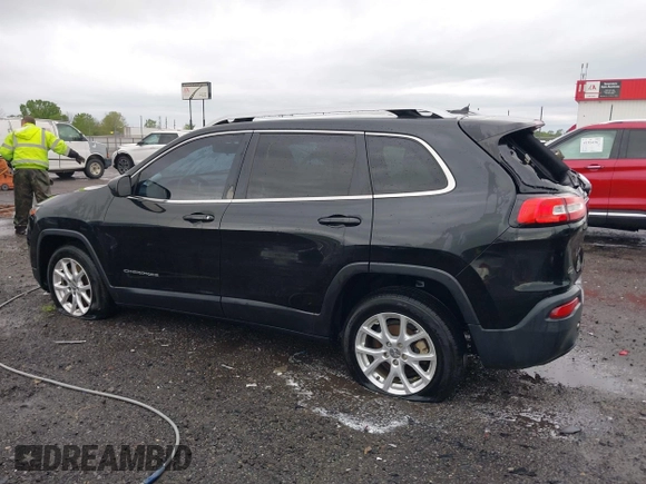 2015 Jeep Cherokee Latitude with VIN 1C4PJLCB0FW676917, listed as a IAAI auction lot 41928270 with 181,134 mi miles and . Bid and sale history available at carsss.com. Image 14.