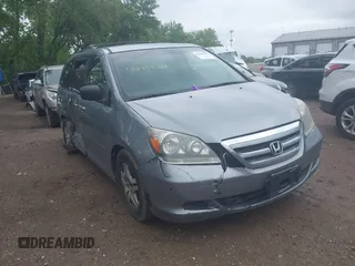 2007 Honda Odyssey EX with VIN 5FNRL38407B084436, listed as a IAAI auction lot 42355391 with 144,607 mi miles and . Bid and sale history available at DreamBid. Image 1.