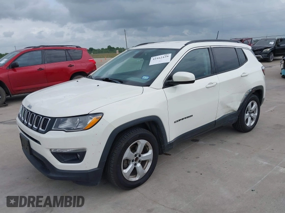 2019 Jeep Compass Latitude with VIN 3C4NJCBB9KT652088, listed as a IAAI auction lot 42162439 with 97,276 mi miles and . Bid and sale history available at DreamBid. Image 2.