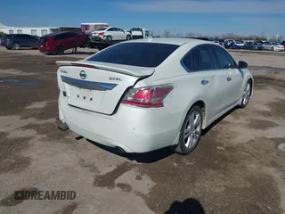 2015 Nissan Altima S z VIN 1N4BL3AP7FC436368, wystawiony jako IAAI lot #41609849 z przebiegiem 228 598 mil mil oraz . Historia ofert i sprzedaży dostępna na DreamBid. Obrazek 4.